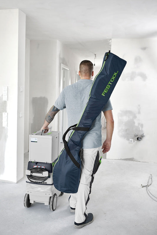 Festool PLANEX LHS 2-M 225 EQ Langhalsschleifer in Anwendung an Decke mit Absauganlage und Transporttasche.