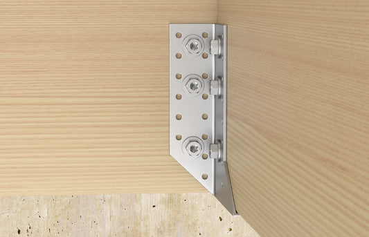 Stahlwinkelverbindung mit fischer Holzbauschraube PowerFast FPF II HWTF – Sechskantschrauben sichern Holzbalken kraftschlüssig an Betonuntergrund im konstruktiven Holzbau.