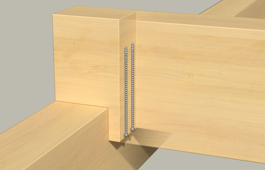 Massive Holzbalken-Verbindung mit zwei fischer PowerFull II CHTF BC Vollgewindeschrauben für hohe Auszugs- und Quertragfähigkeit im konstruktiven Holzbau.